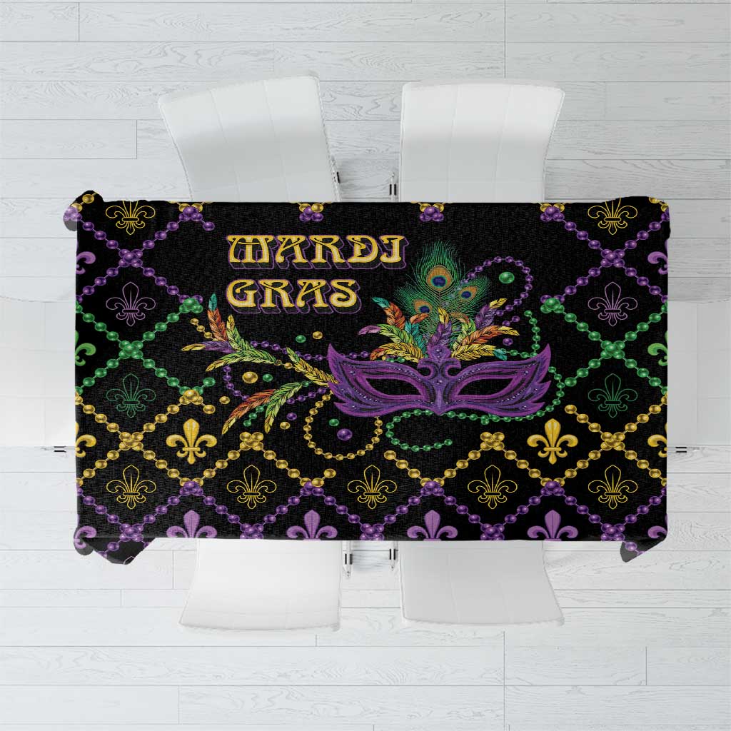 Black geometric Mardi Gras tablecloth with purple, green, and gold fleur-de-lis pattern