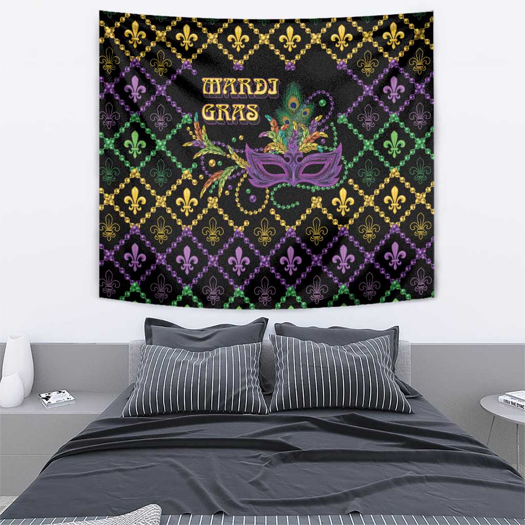 Black Mardi Gras tapestry close-up with gold fleur-de-lis, purple/green geometric pattern