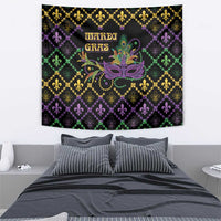 Black Mardi Gras tapestry close-up with gold fleur-de-lis, purple/green geometric pattern