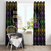 Black Mardi Gras curtains with gold fleur-de-lis top trim, purple mask, and green accents