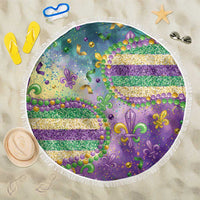 Round beach blanket in purple with fleur-de-lis and glitter bead stripes, white fringe