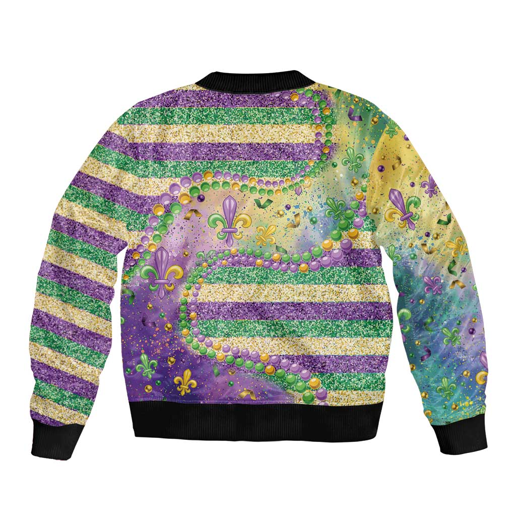 Unisex bomber jacket, back view with glitter bead Fleur de Lis on purple & gold stripes