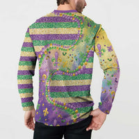 Purple and gold striped sweatshirt back with fleur-de-lis motifs, glitter, and bead trim
