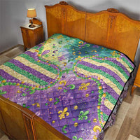 Purple, teal, and gold fleur-de-lis quilt with striped design and raised bead details