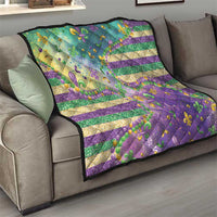 Fleur-de-lis quilt blanket with purple, teal, and gold striped bands and bead details