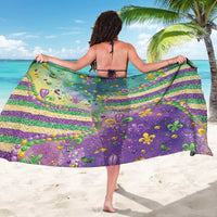 Purple fleur de lis sarong with glitter bead pattern, striped band detail