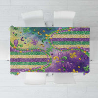 Purple Mardi Gras fleur de lis tablecloth with glitter beaded pattern, top view