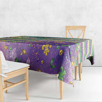 Purple Mardi Gras fleur de lis tablecloth with glitter beaded pattern, corner detail