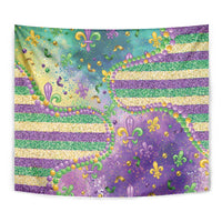 Close-up Mardi Gras purple tapestry with gold and green glitter, fleur-de-lis, and bead accents
