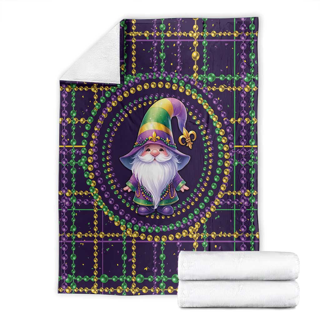 Mardi Gras gnome blanket fold with gnome medallion and green-gold beaded grid on dark purple