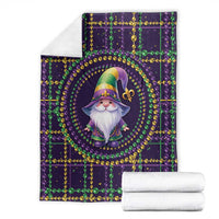 Mardi Gras gnome blanket fold with gnome medallion and green-gold beaded grid on dark purple
