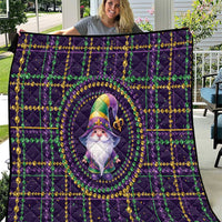 Purple quilt with gnome medallion, fleur-de-lis and bead-like green/gold pattern