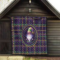 Purple quilt hung with gnome emblem, fleur-de-lis detail, green and gold bead accents