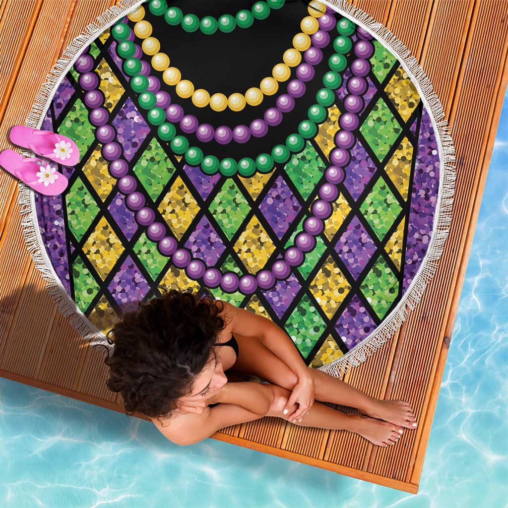 Round beach blanket with multicolor bead garlands, green purple yellow diamonds, white fringed edge