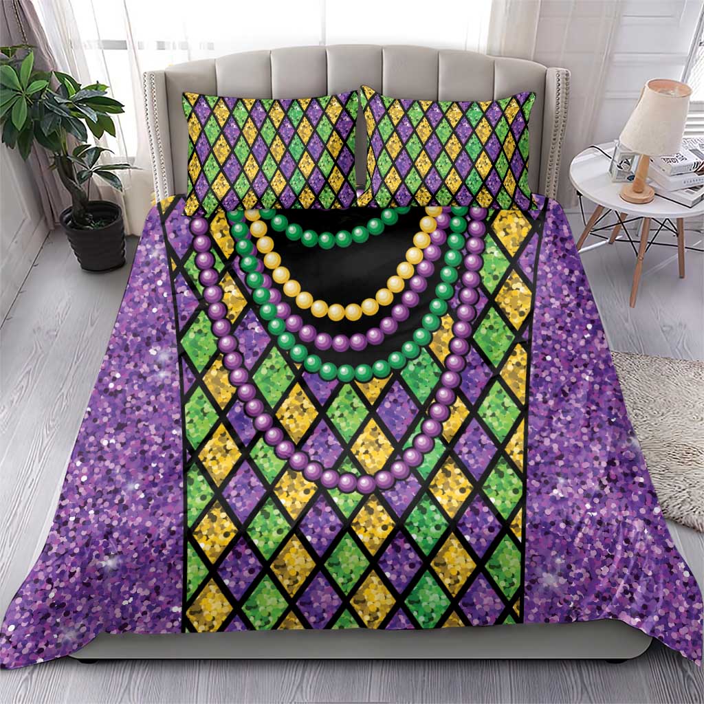 Purple bedding set with diamond pattern and multicolor bead necklaces; duvet and 2 pillows