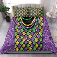 Purple bedding set with diamond pattern and multicolor bead necklaces; duvet and 2 pillows