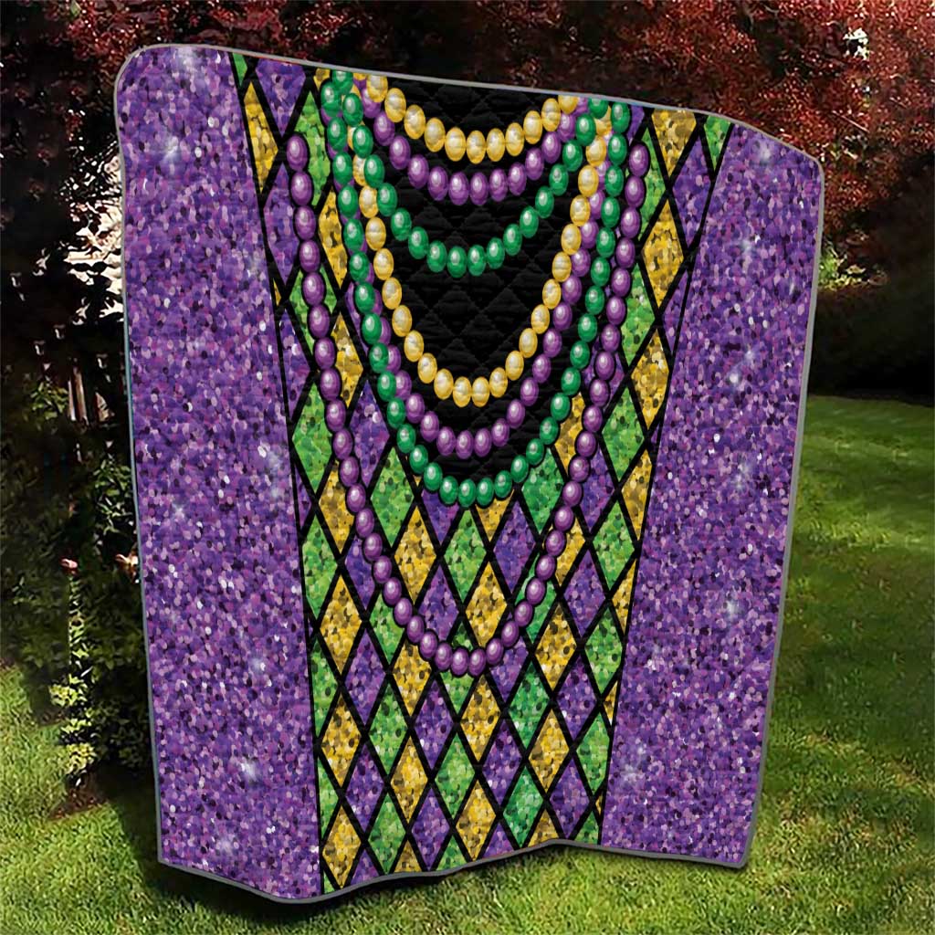 Purple Mardi Gras strings of beads quilt draped view with black panel and green bead strands