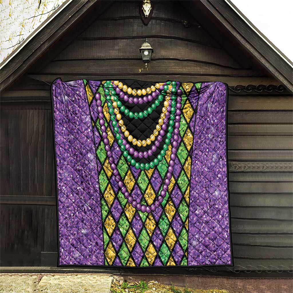 Purple Mardi Gras strings of beads quilt front view with diamond lattice trim and bead garlands