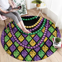 Round carpet with beaded rainbow loop and black diamond check pattern, green purple yellow
