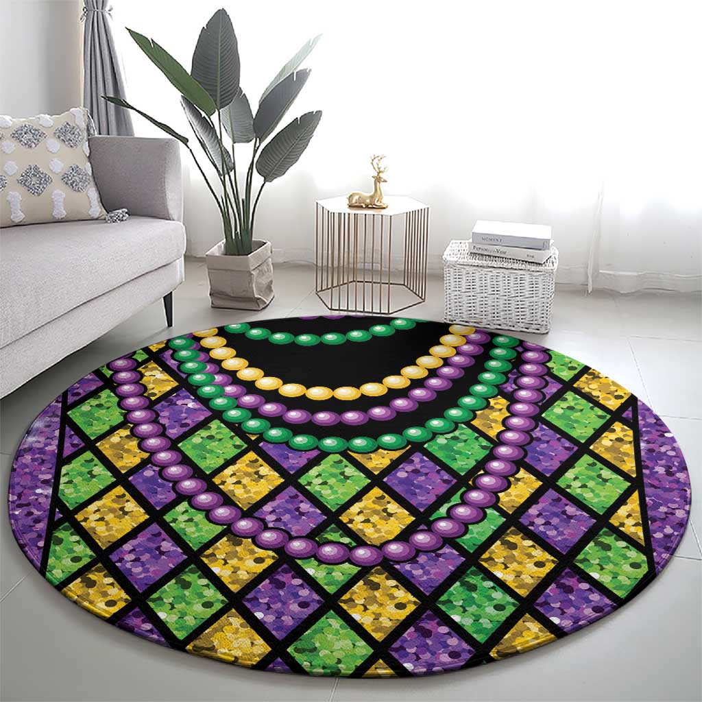 Round Mardi Gras carpet featuring green purple yellow bead loops over black diamond lattice