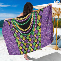 Beaded diamond Mardi Gras sarong with purple speckled fabric and multicolor bead strings
