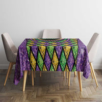 Purple Mardi Gras beaded tablecloth with diamond panels and colorful garland draped across