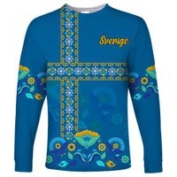 Blue long-sleeve shirt with Swedish cross folk pattern, birds, flowers, and Sverige text