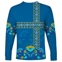Blue long-sleeve shirt with Swedish cross folk pattern, birds and flowers