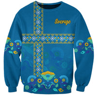 Blue sweatshirt with yellow Nordic cross, floral pattern and 'Sverige' front
