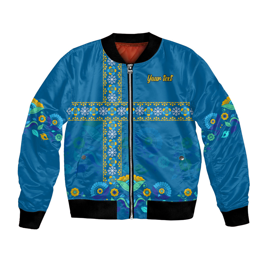 Blue satin bomber jacket with front zip, ribbed collar/cuffs, colorful floral border panel