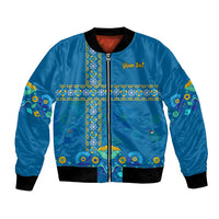 Blue satin bomber jacket with front zip, ribbed collar/cuffs, colorful floral border panel