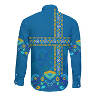 Blue long-sleeve button shirt with colorful back folk cross and floral accents