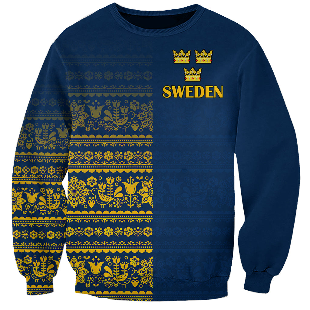 Blue crewneck sweatshirt with Sweden text, crowns, and yellow Scandinavian pattern on front