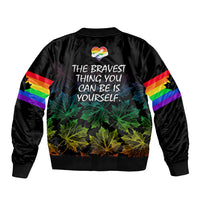 Black unisex bomber jacket with rainbow sleeve stripes, back quote text and maple leaves.
