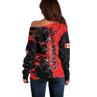 Women’s off-shoulder sweater back, red and black with CANUCKS text and maple leaf