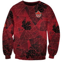 Red crewneck sweatshirt with geometric map pattern and Canada crest on chest