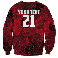 Red crewneck sweatshirt back with YOUR TEXT 21 and geometric map pattern