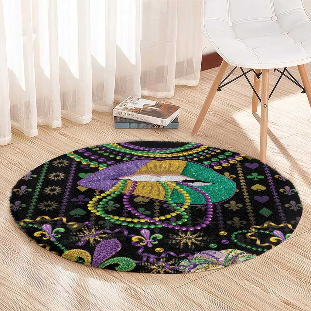 Round black Mardi Gras beads carpet with lips queen graphic, purple green hearts, and fleur-de-lis