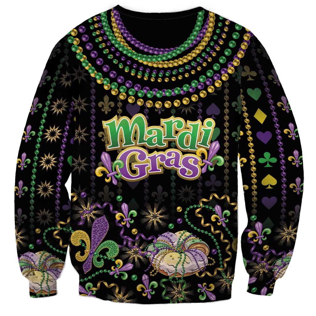 Black unisex sweatshirt with Mardi Gras text, fleur-de-lis icons, and bead pattern