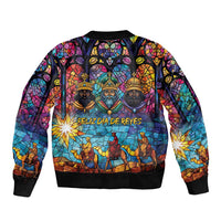 Black zip-up bomber jacket with stained-glass Nativity scene, ribbed cuffs, full front