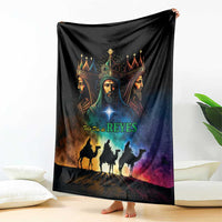 Three Kings Day blanket, black with crowned faces, star center, and camel silhouettes