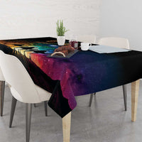 Black tablecloth draped on dining table with starry galaxy and road artwork