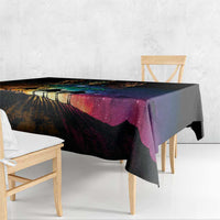Black tablecloth with colorful galaxy road pattern draped over table
