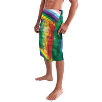 Rainbow print sarong skirt worn as a wrap, multicolor slogan panels