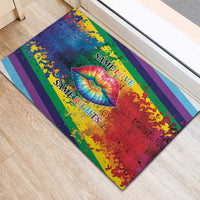 Rainbow striped doormat with colorful lips graphic and repeating “Same Love / Same Rights”