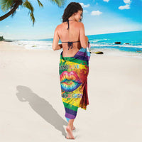 Rainbow striped sarong with kiss lips graphic and “Same Rights” text, back view