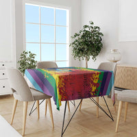 Rainbow lips pride tablecloth draped on dining table with multicolor stripe border