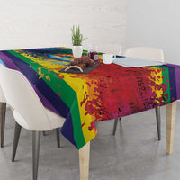 Rainbow pride tablecloth with colorful lips design and stripe accents on dining table