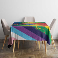 Rainbow pride tablecloth on dining table with multicolor stripe pattern and clean drape