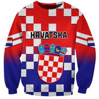 Red crewneck sweatshirt with blue checker sleeves and Croatia crest graphic, HRVATSKA text